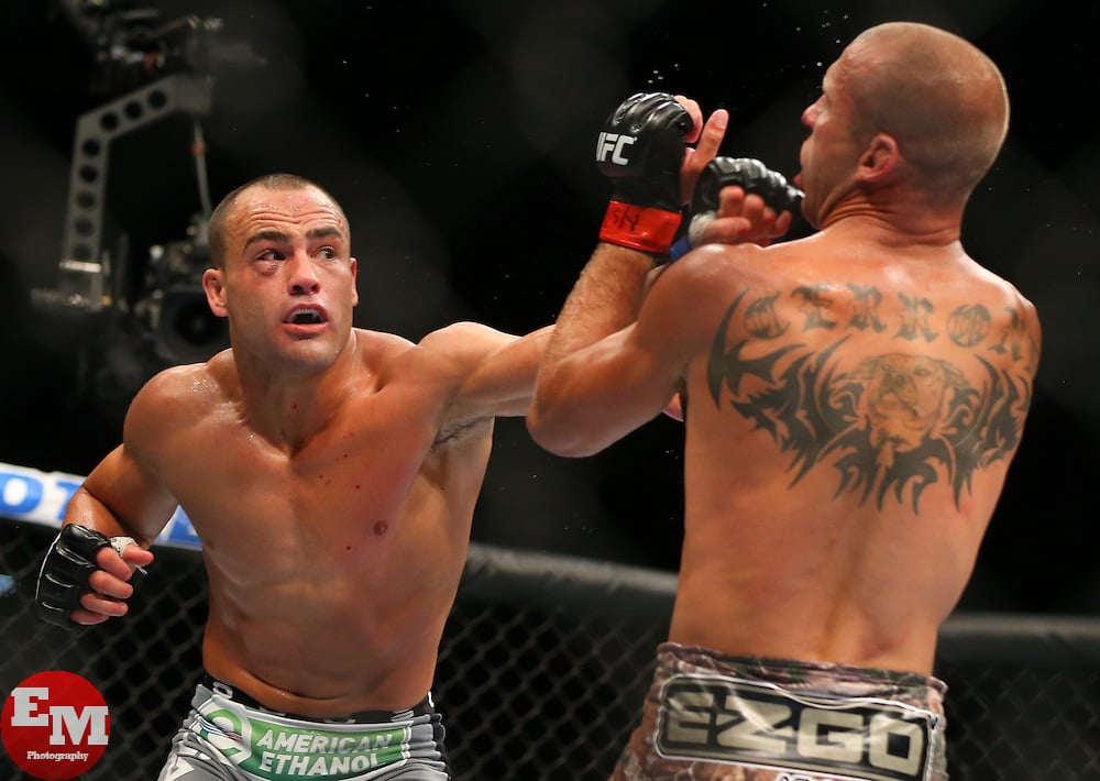 Las Vegas, Nevada, USA - September 27, 2014: Donald Cerrone (orange trunks) and Eddie Alvarez (gray trunks) during their main card bout at UFC 178 at the MGM Grand Garden Arena in Las Vegas, Nevada. Ed Mulholland for ESPN