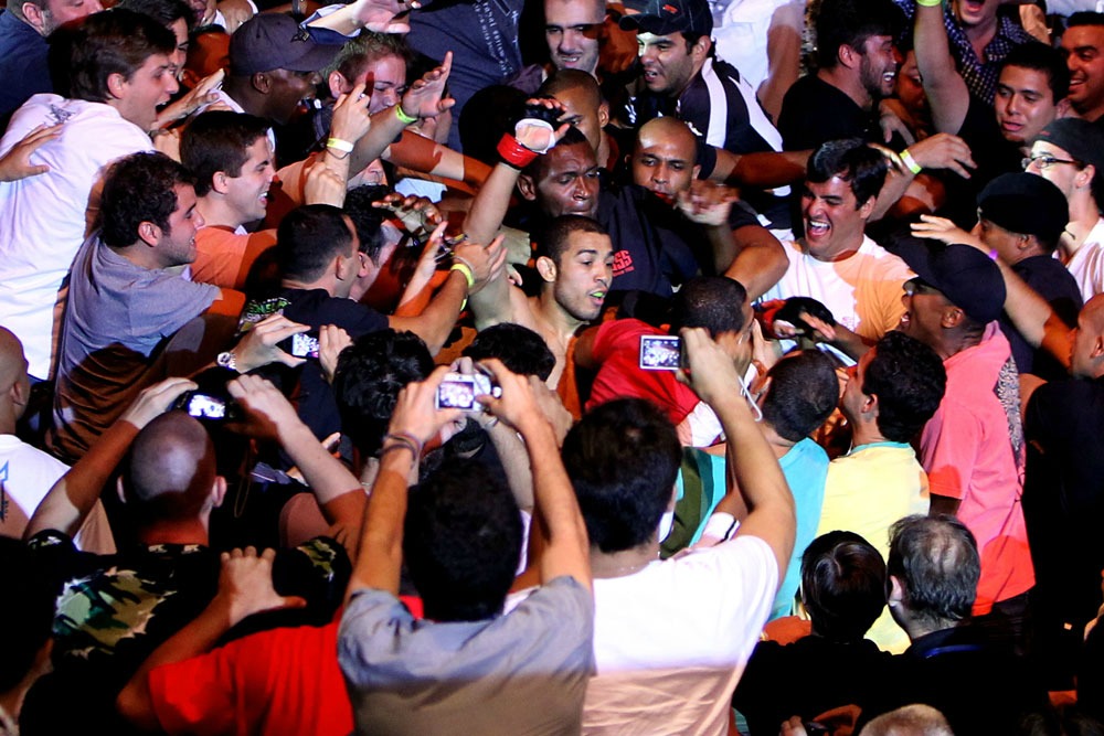 RIO DE JANEIRO, BRAZIL - JANUARY 14: Jose Aldo (C) celebrates in the crowd after defeating Chad Mendes in a featherweight bout during UFC 142 at HSBC Arena on January 14, 2012 in Rio de Janeiro, Brazil. (Photo by Josh Hedges/Zuffa LLC/Zuffa LLC via Getty Images)