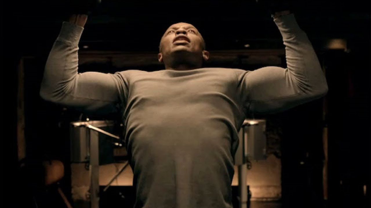 Dr Dre Doing Pull Ups in a Gym
