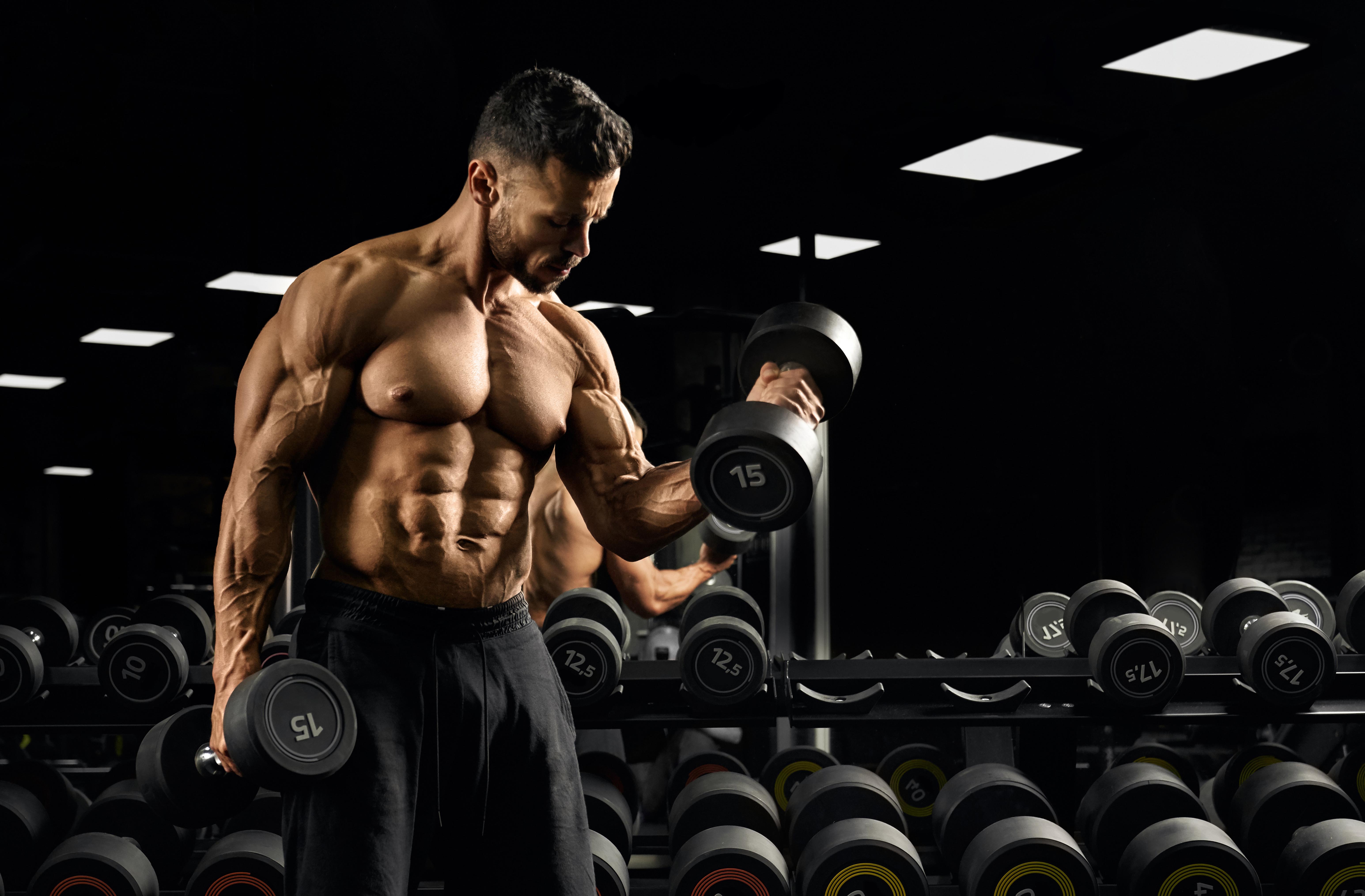 building biceps with dumbbell.