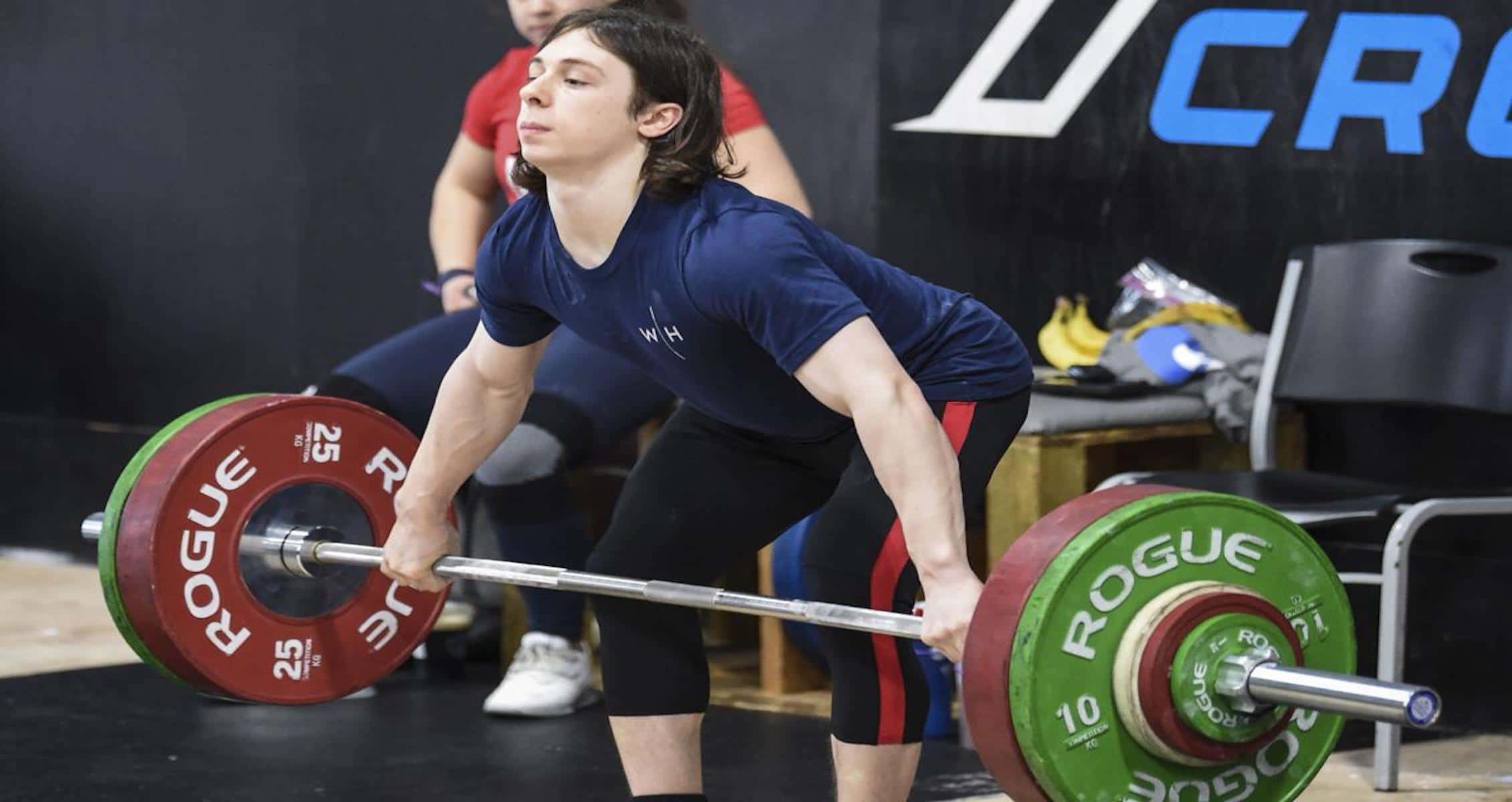 Milton High student beats world records in weightlifting