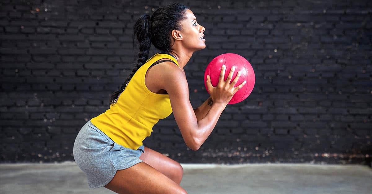 GRT-female-workout-medicine-ball-squat-1200x628-facebook-1200x628-1.jpg