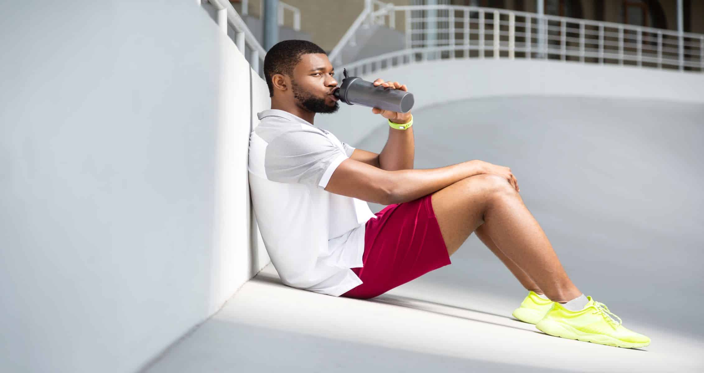 calm-young-male-athlete-sitting-at-the-stadium-2022-01-27-22-56-15-utc.jpg