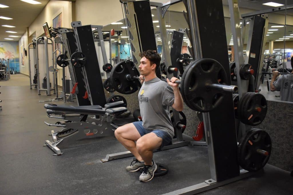 Narrow stance outlet smith machine squat