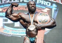 Samson Dauda poses with belt after his victory during the Romania Muscle Fest Pro on Sunday.