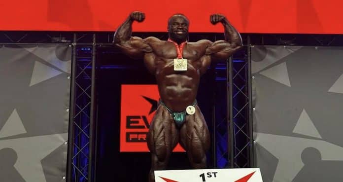 Samson Dauda poses with the gold medal following his victory during the 2023 EVLS Prague Pro.