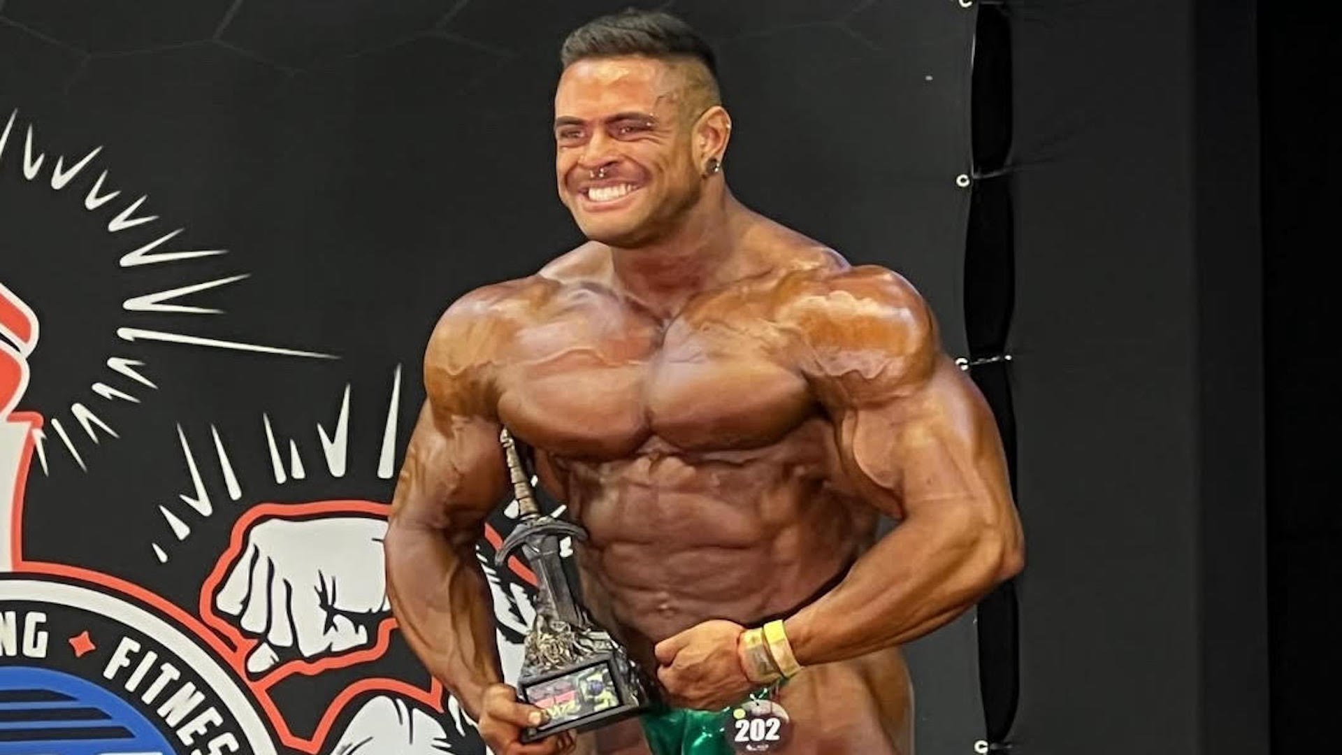 Bodybuilding Champ Dead at 31 Just Weeks After Proposing to Girlfriend on  Stage